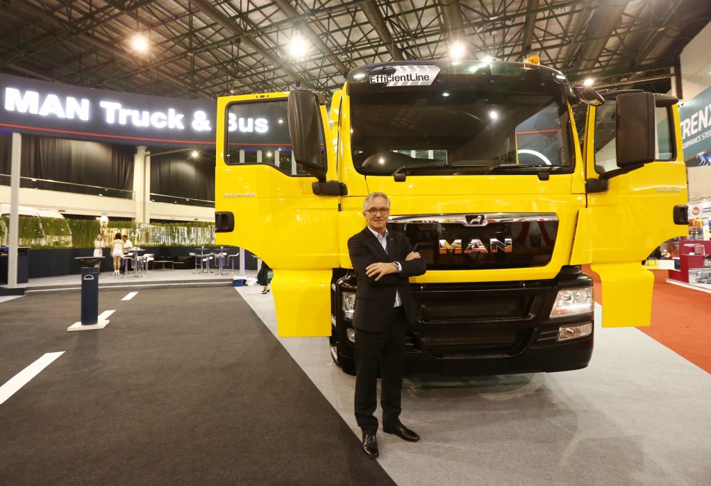 Hartmut Mueller, Managing Director of MAN Truck and Bus (M) Sdn Bhd with the MAN Efficient Line truck at the Malaysia Commercial Vehicle Expo 2017.